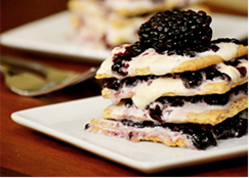 Stack of Blackberry and blueberry icebox cake